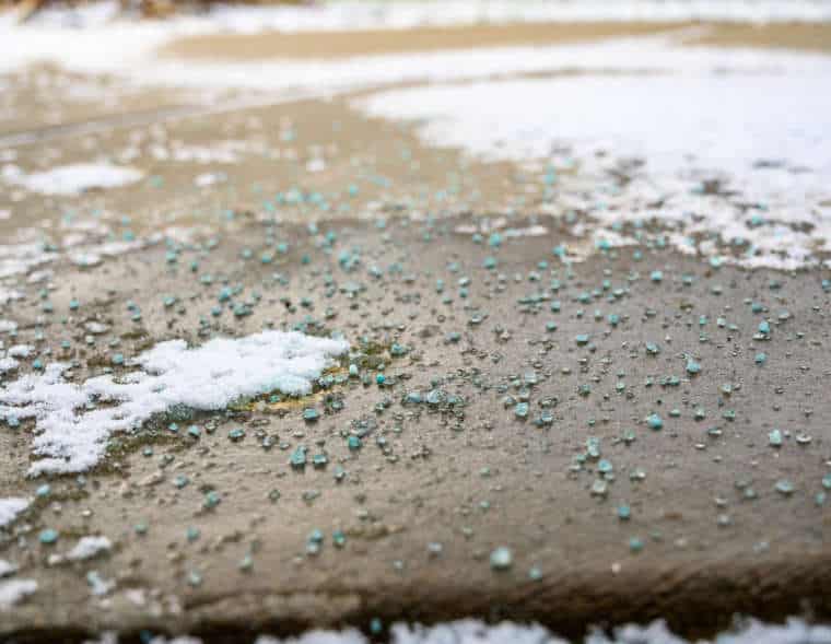 close focused low angle view of salt, ice, and snow